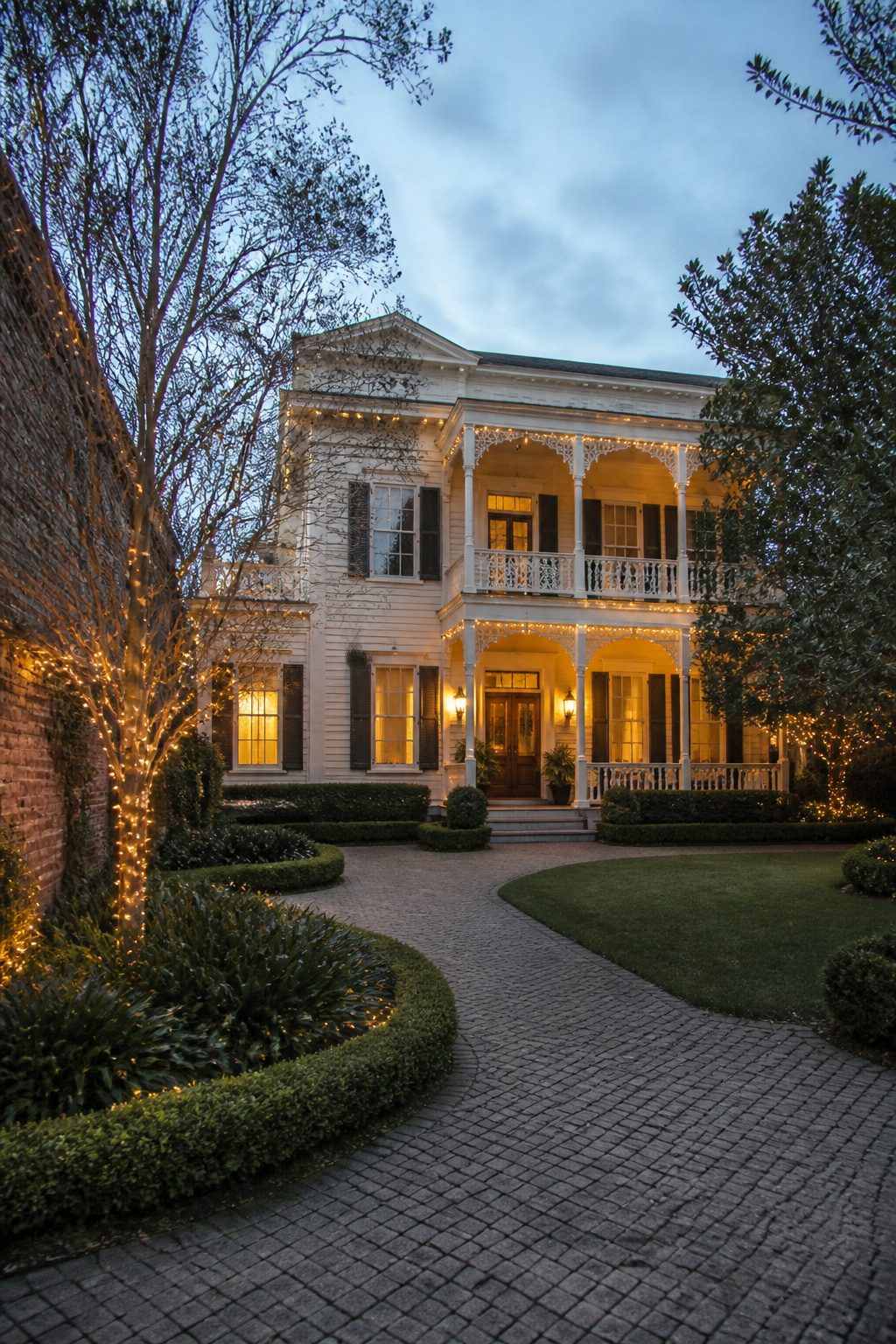 Victorian houses in Madison's historic district adorned with holiday decorations.