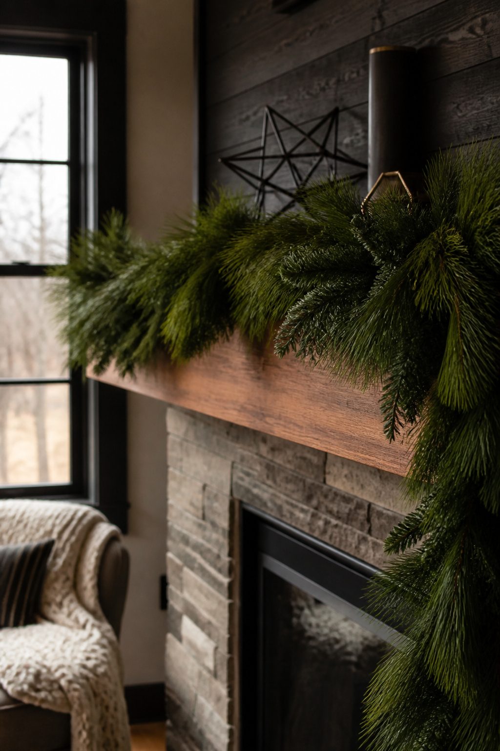 Brighton Pine garland on a wooden mantel.